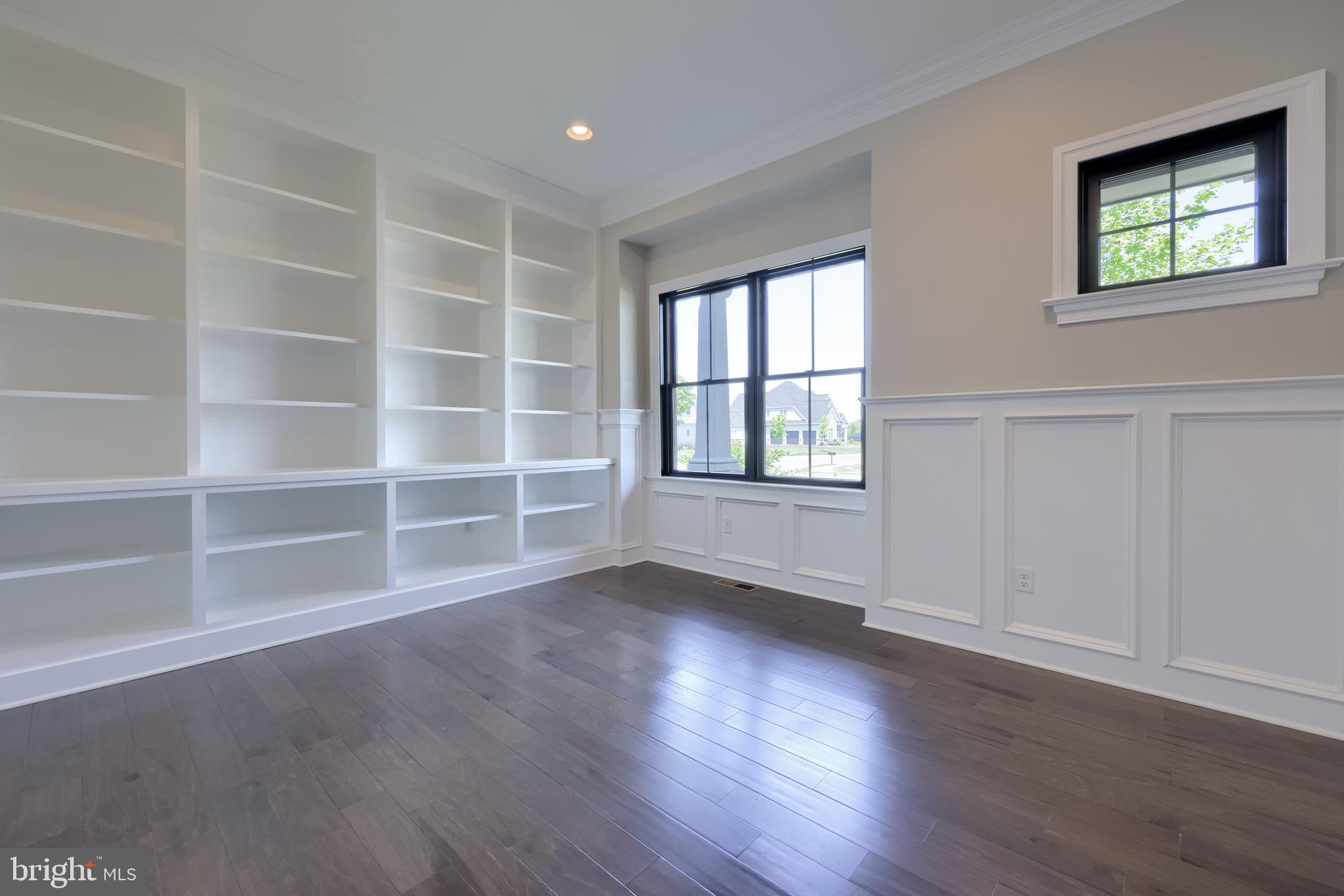 428 Southampton Drive Lititz, PA 17543 - Photo 13 of 60 a view of an empty room with a window and wooden floor
