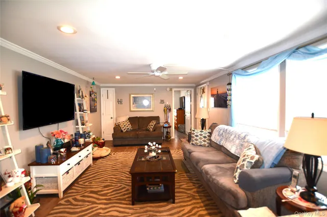 a kitchen with stainless steel appliances a stove sink microwave and cabinets