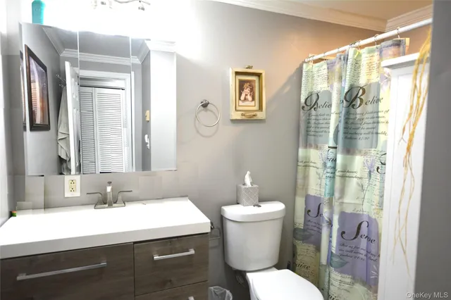 a white refrigerator freezer sitting inside of a kitchen