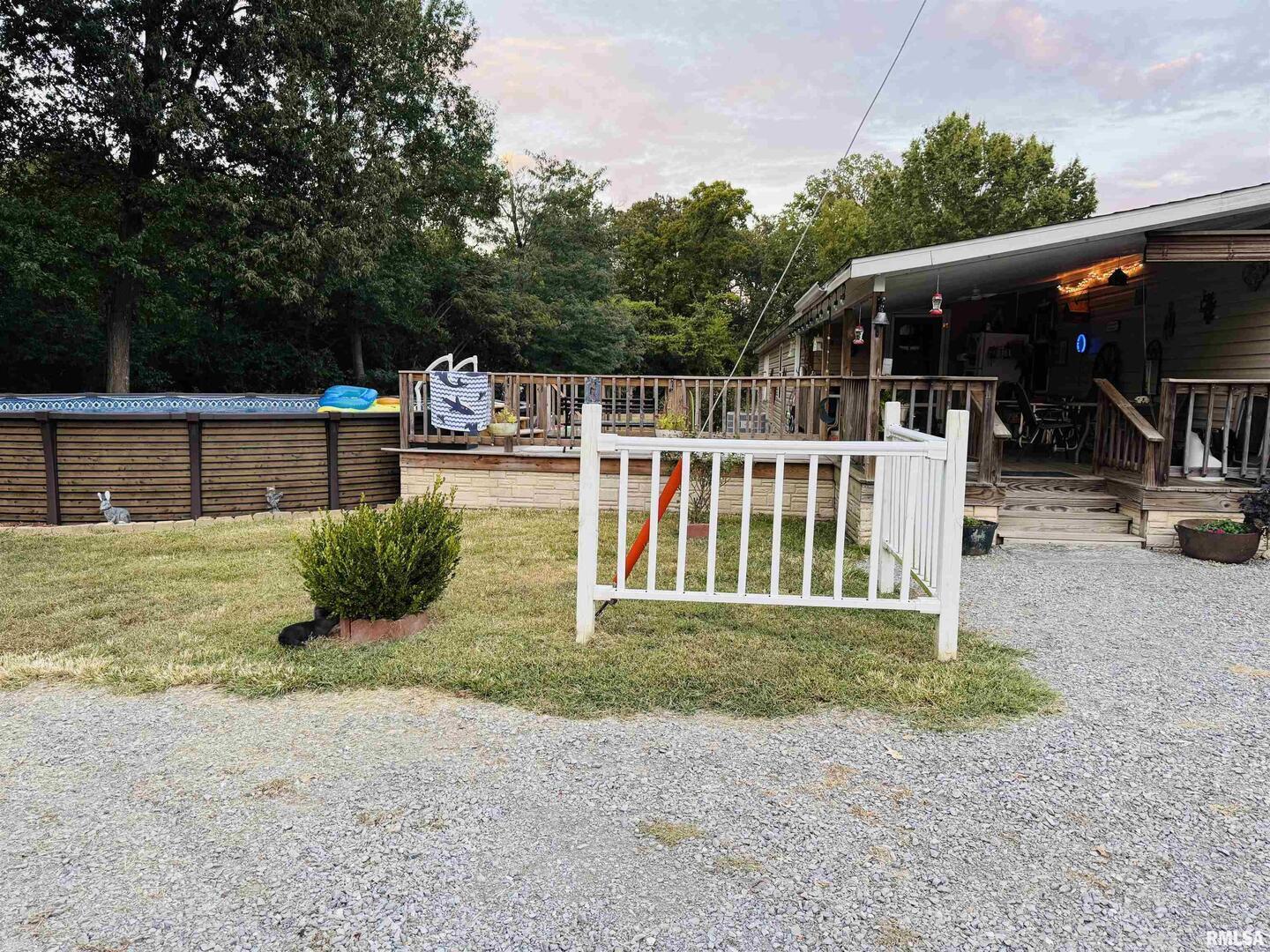 3920 Herrin Road Carterville, IL 62918 - Photo 23 of 34 a view of a house with backyard and porch