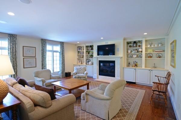 77 Cliff Road Wellesley, MA 02481 - Photo 12 of 29 a living room with furniture fireplace and window