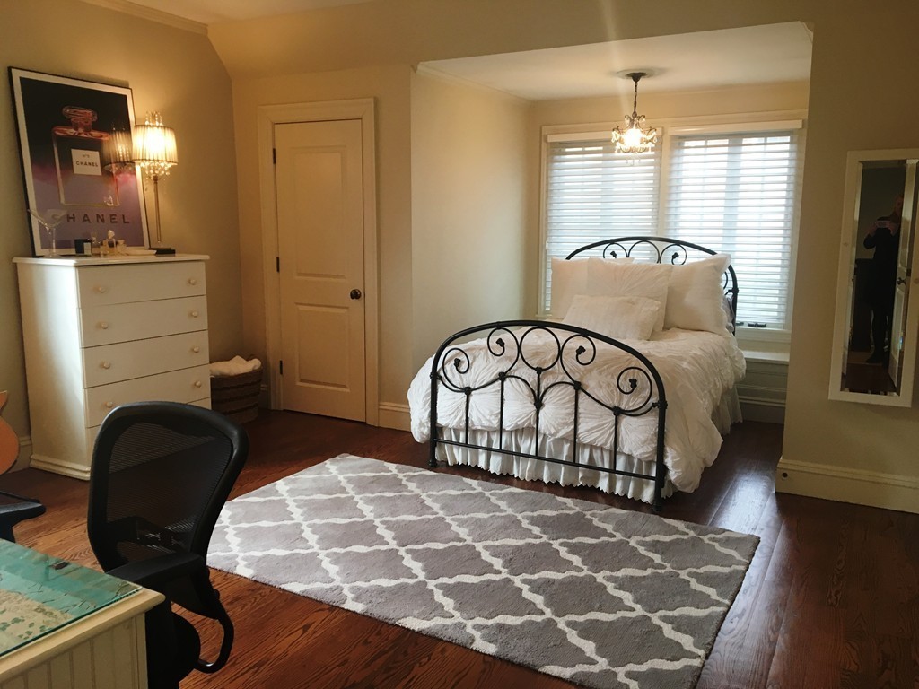 77 Cliff Road Wellesley, MA 02481 - Photo 14 of 29 a bedroom with a bed and window