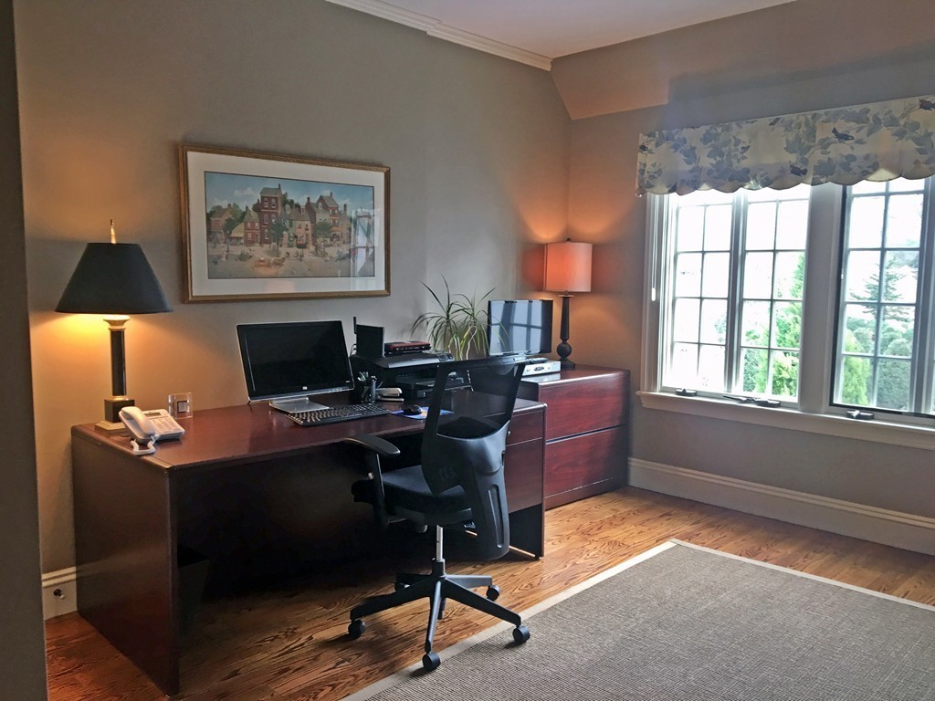 77 Cliff Road Wellesley, MA 02481 - Photo 17 of 29 a view of a workspace with furniture and a window