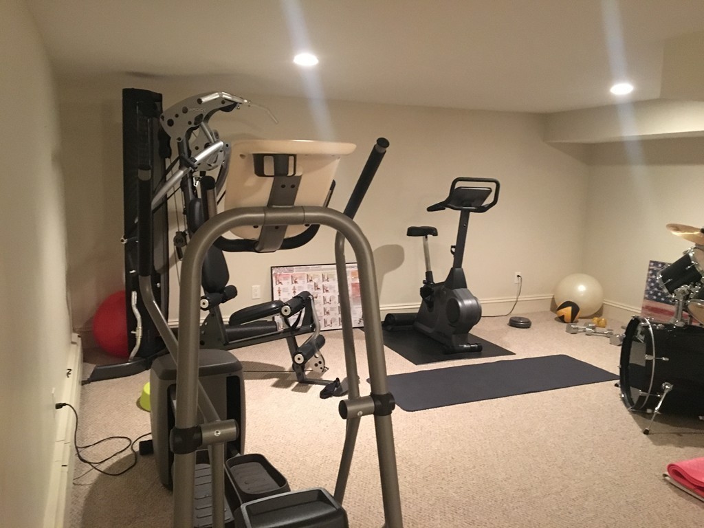 77 Cliff Road Wellesley, MA 02481 - Photo 19 of 29 a view of a room with gym equipment