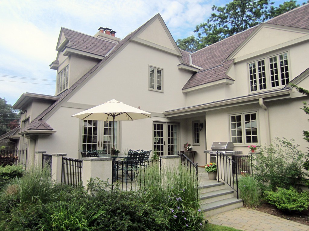 77 Cliff Road Wellesley, MA 02481 - Photo 22 of 29 a front view of a house with garden