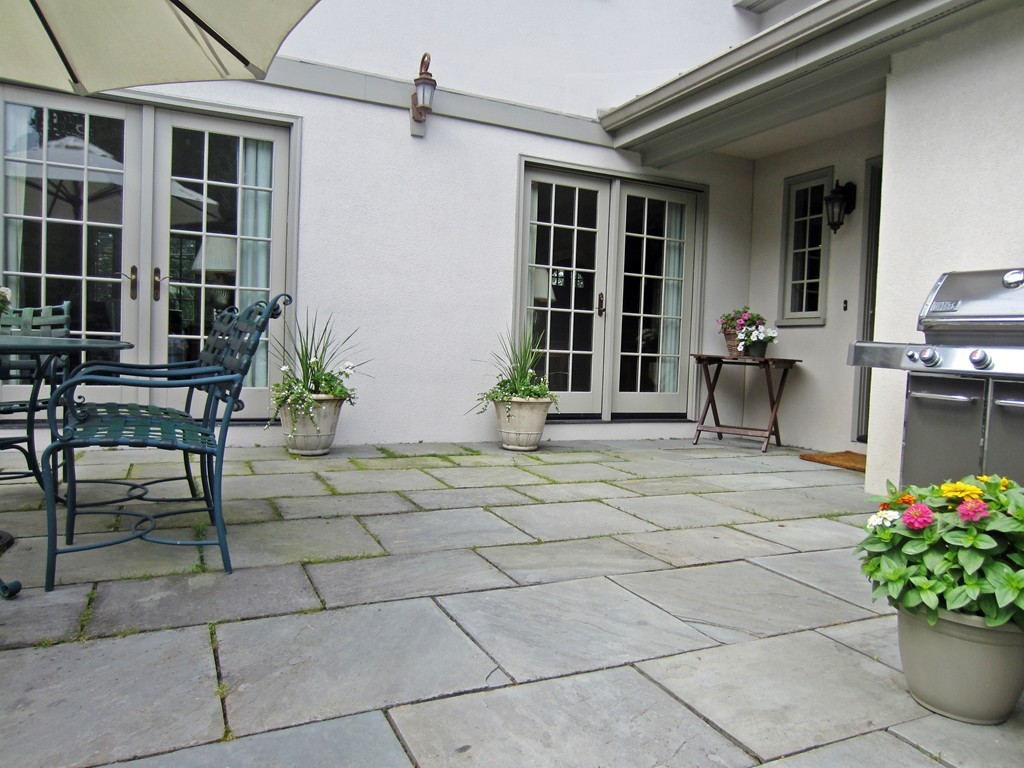 77 Cliff Road Wellesley, MA 02481 - Photo 23 of 29 a living room filled with furniture