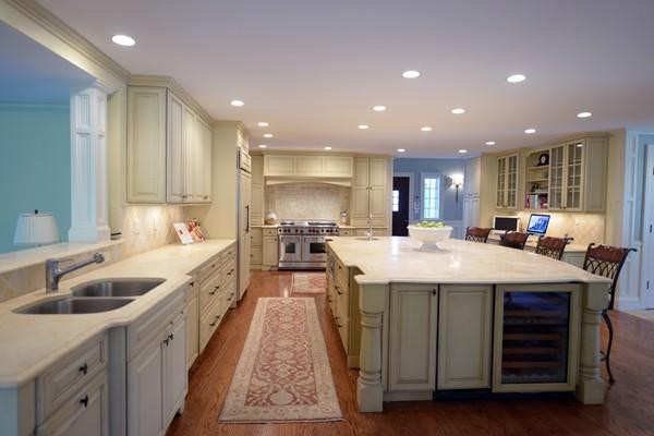 77 Cliff Road Wellesley, MA 02481 - Photo 7 of 29 a large kitchen with kitchen island a sink a counter top space