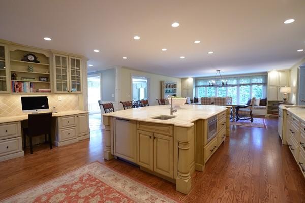 77 Cliff Road Wellesley, MA 02481 - Photo 9 of 29 a kitchen with a stove and a refrigerator