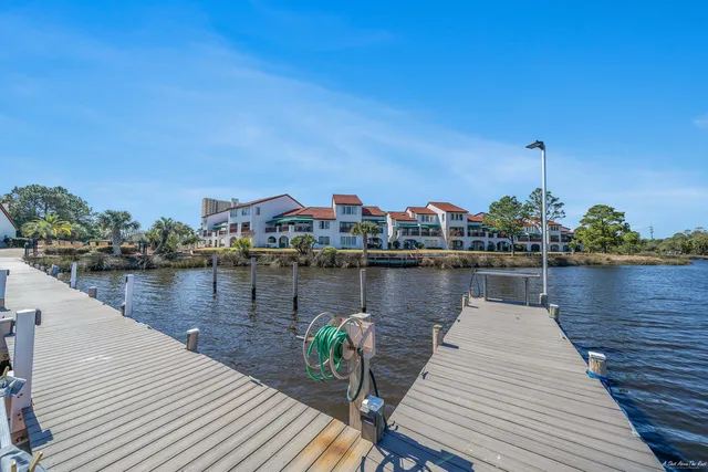 a view of a lake and boats