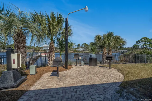 a view of a backyard with a patio