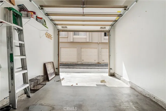 a front view of a house with a garage