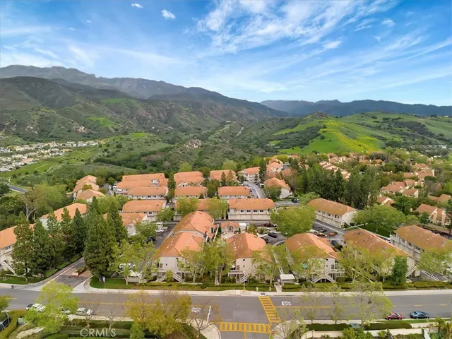 an aerial view of a city with lots of residential buildings