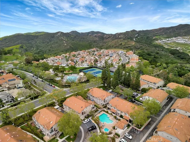 a view of a city with mountains in the background