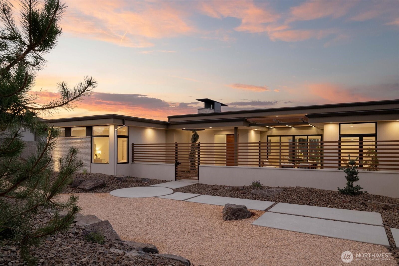 104118 East Addison Avenue Kennewick, WA 99338 - Photo 1 of 40 a front view of a house with a yard
