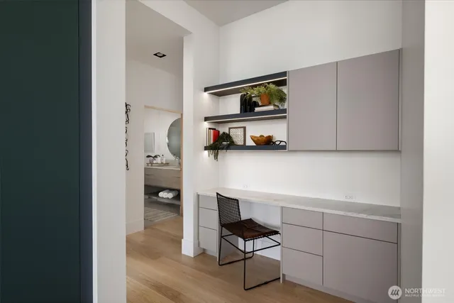 a room with furniture and a book shelf