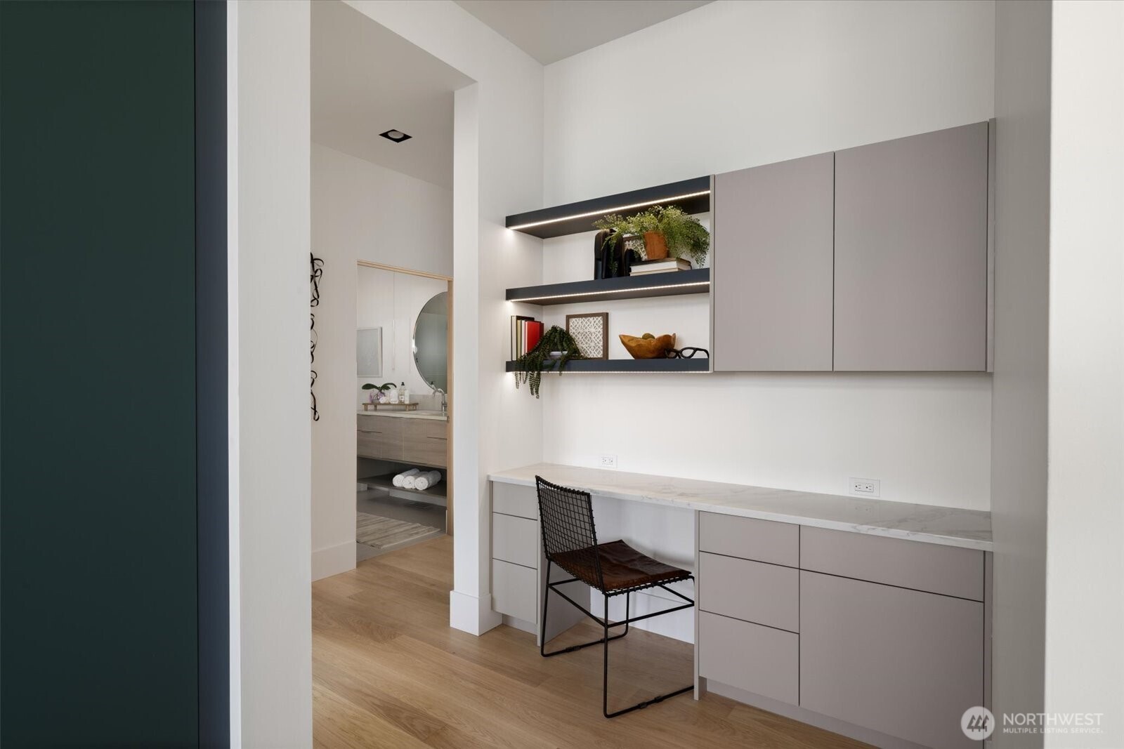 104118 East Addison Avenue Kennewick, WA 99338 - Photo 15 of 40 a room with furniture and a book shelf