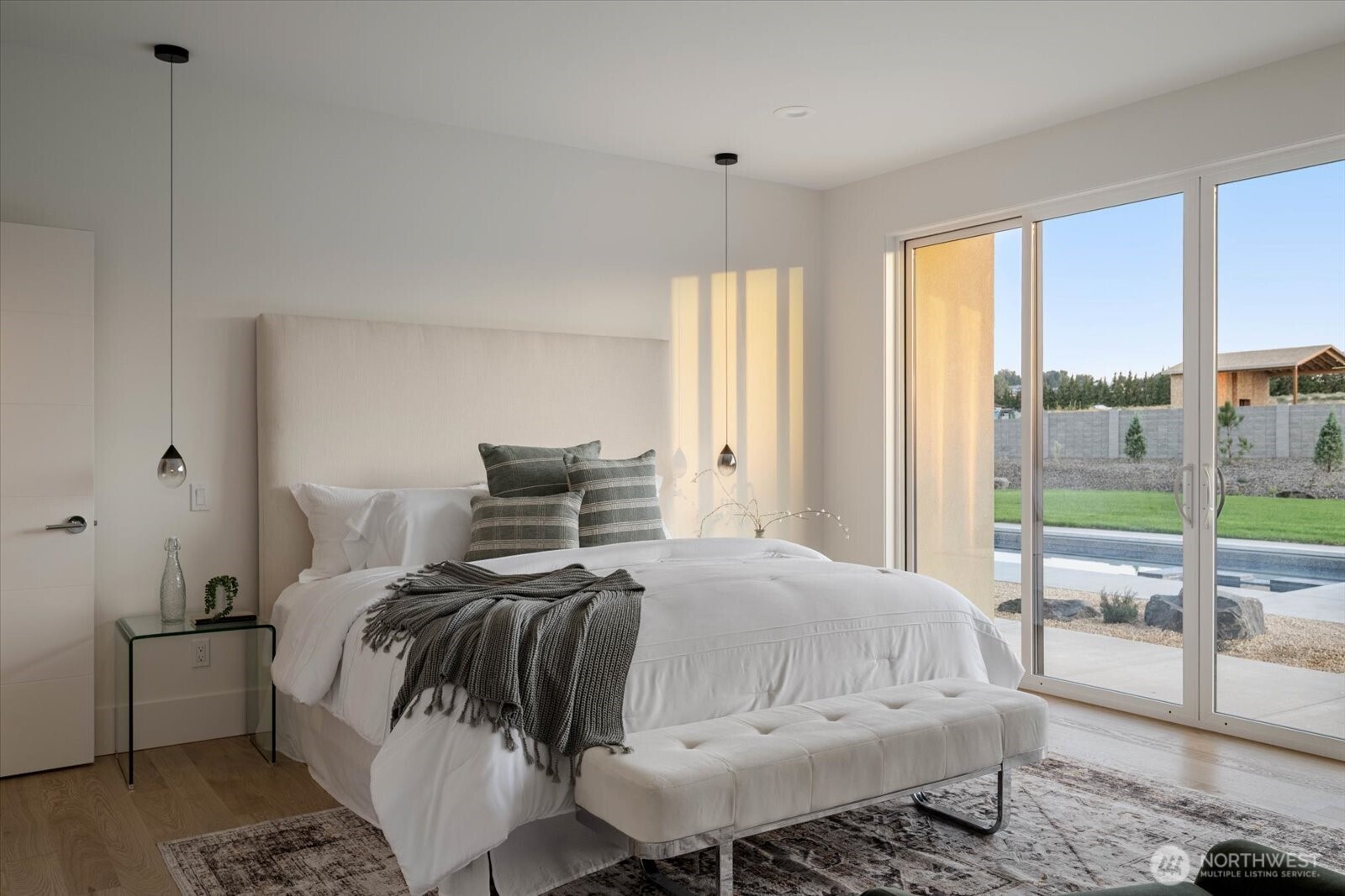 104118 East Addison Avenue Kennewick, WA 99338 - Photo 16 of 40 a bedroom with a bed and large window