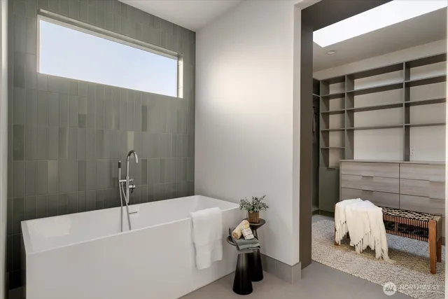 a bathroom with a sink and a bathtub