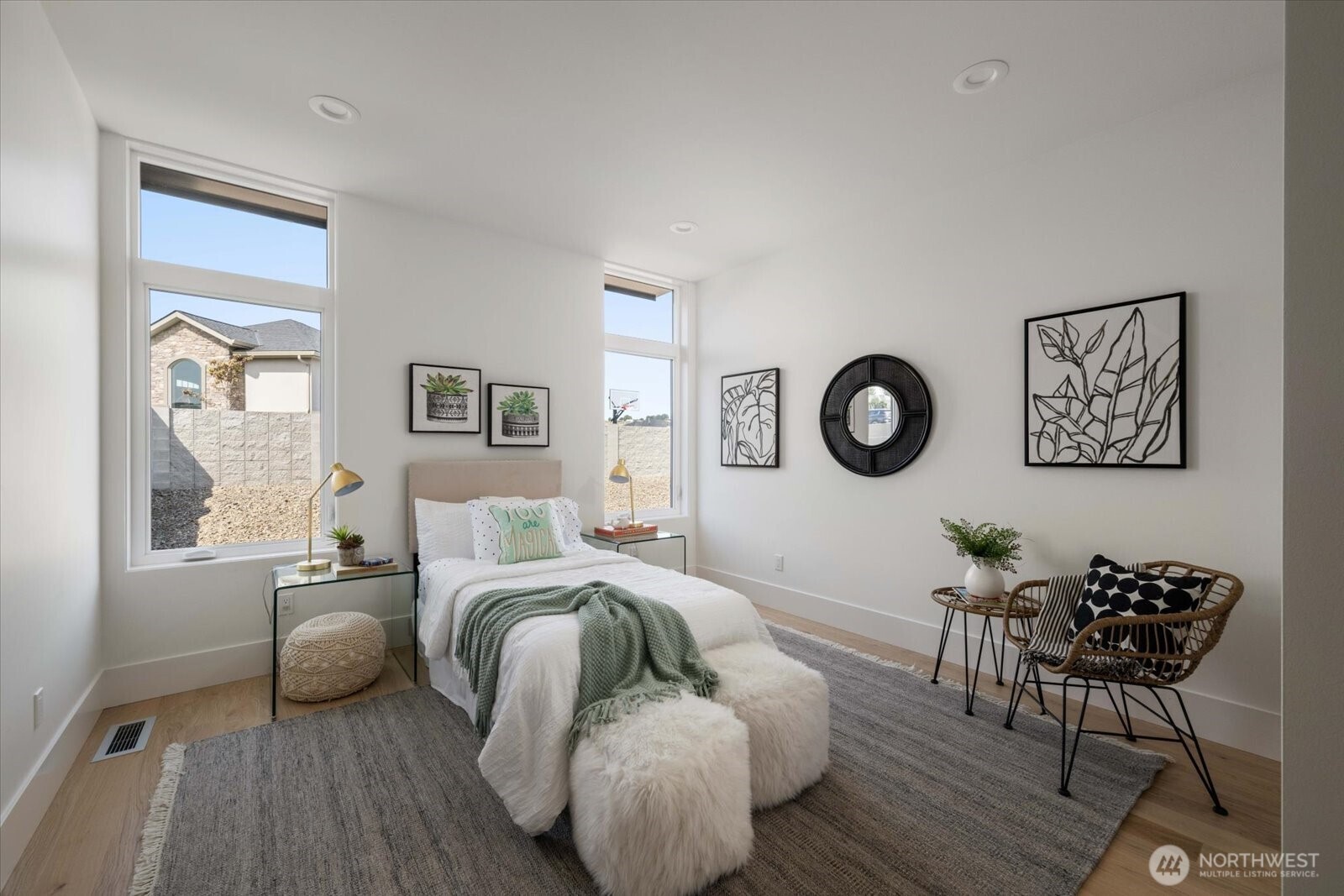 104118 East Addison Avenue Kennewick, WA 99338 - Photo 29 of 40 a bedroom with furniture and a window