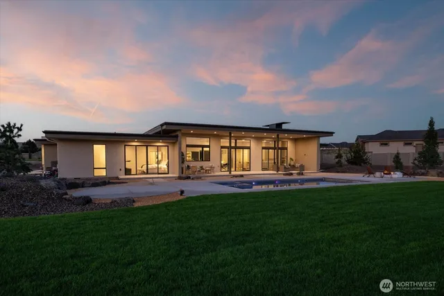a view of a house with a back yard