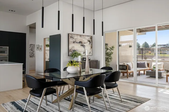 a view of a dining room with furniture window and outside view