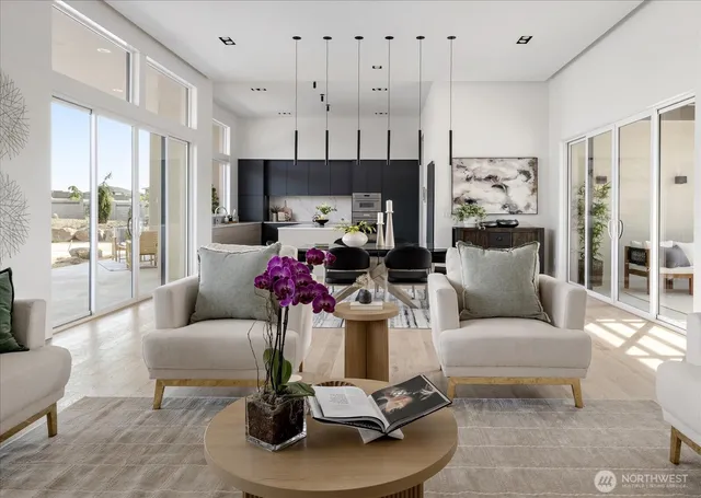 a living room with furniture a fireplace and a table