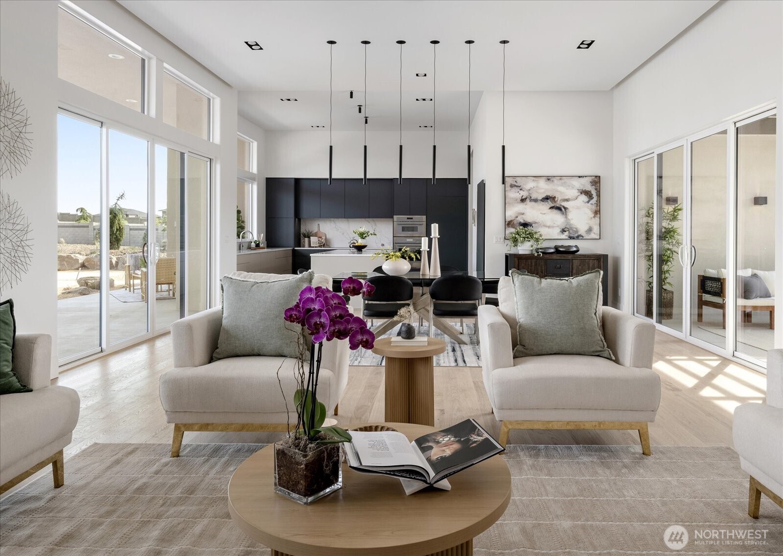 104118 East Addison Avenue Kennewick, WA 99338 - Photo 7 of 40 a living room with furniture a fireplace and a table