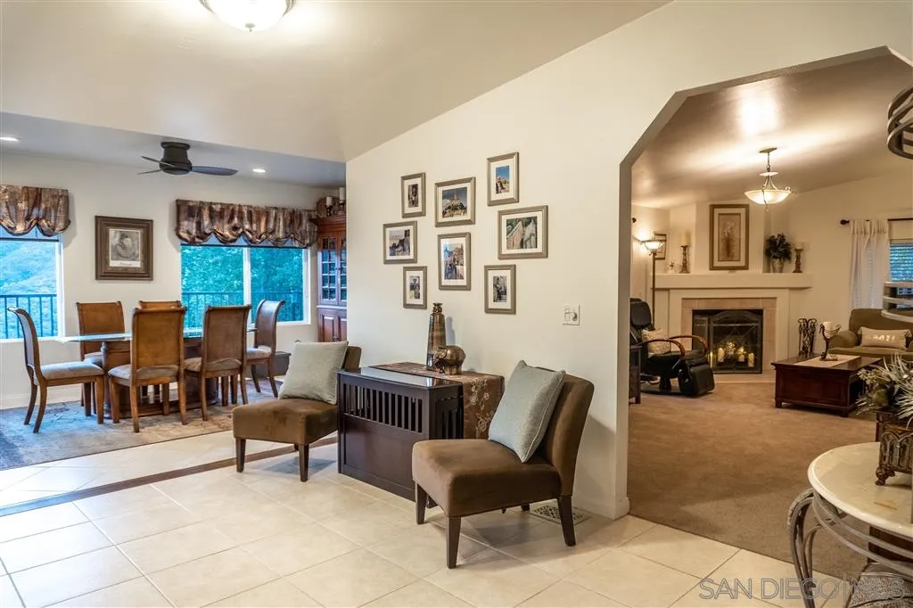 39325 De Luz Road Fallbrook, CA 92028 - Photo 11 of 25 a living room with furniture and a fireplace