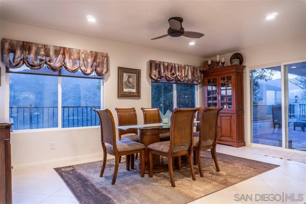 39325 De Luz Road Fallbrook, CA 92028 - Photo 15 of 25 a view of a dining room with furniture