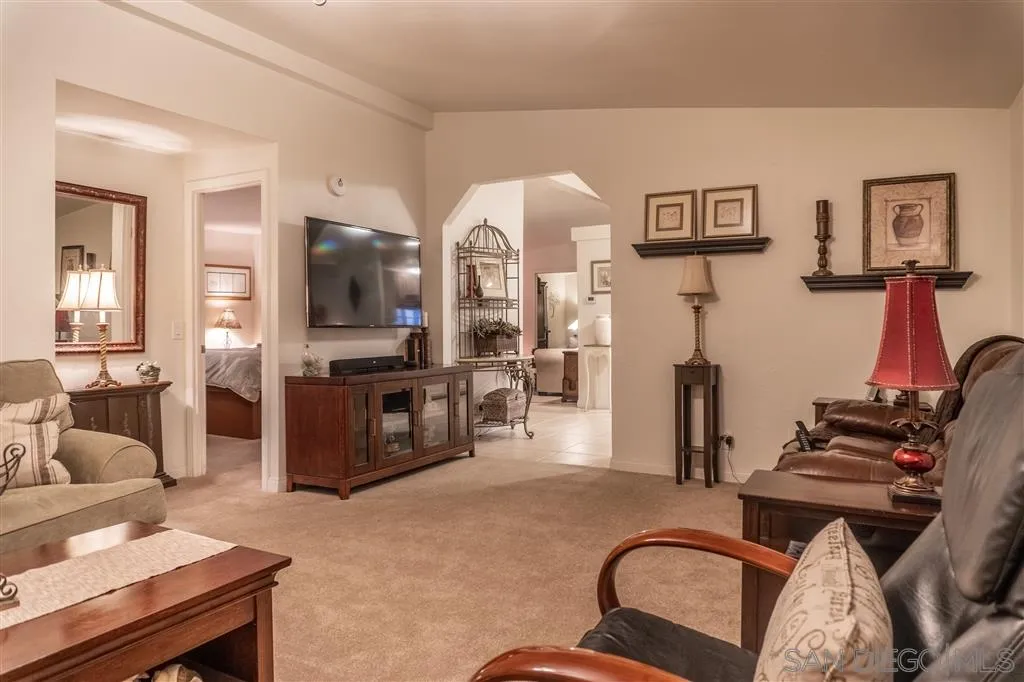39325 De Luz Road Fallbrook, CA 92028 - Photo 18 of 25 a living room with furniture and wooden floor