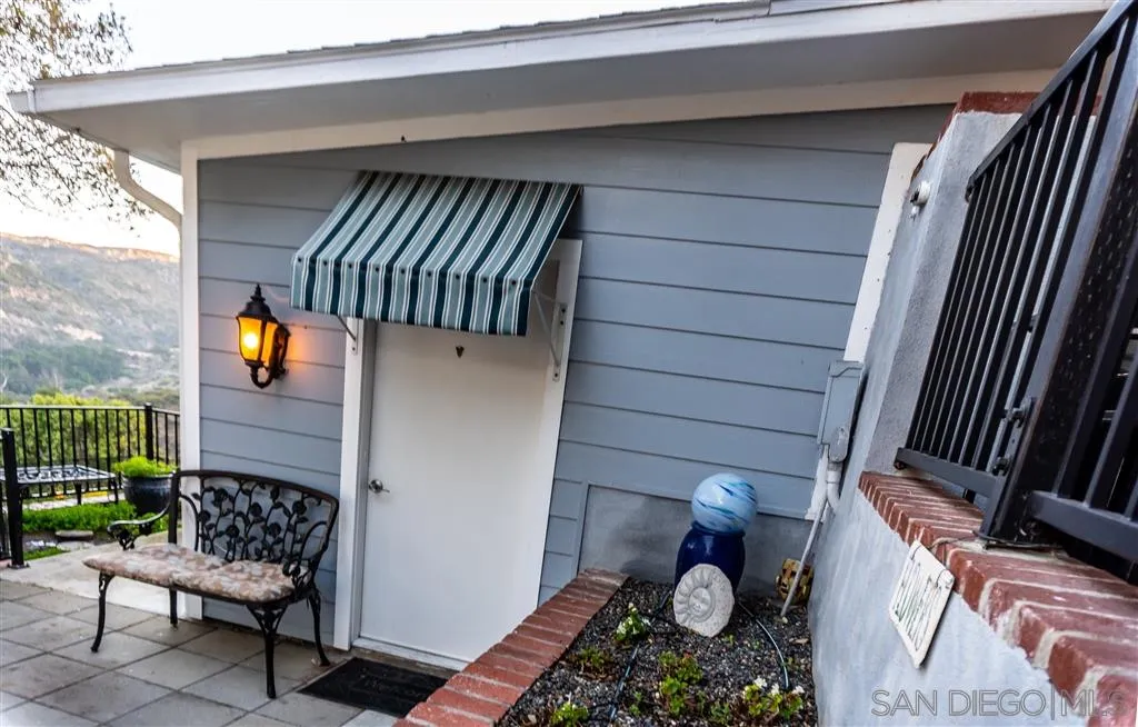 39325 De Luz Road Fallbrook, CA 92028 - Photo 21 of 25 a view of entryway and hall with wooden floor