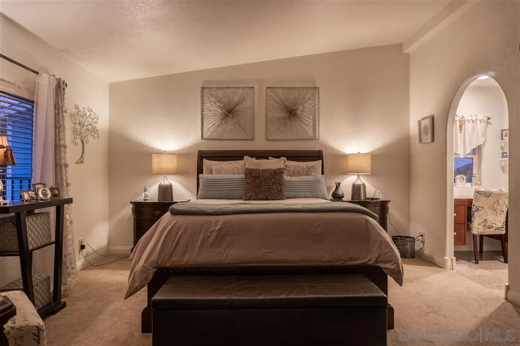 39325 De Luz Road Fallbrook, CA 92028 - Photo 9 of 25 a bedroom with a bed and window