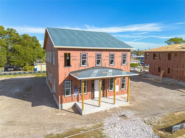a front view of a house with a porch