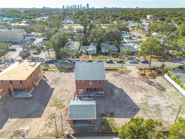 an aerial view of a house with outdoor space
