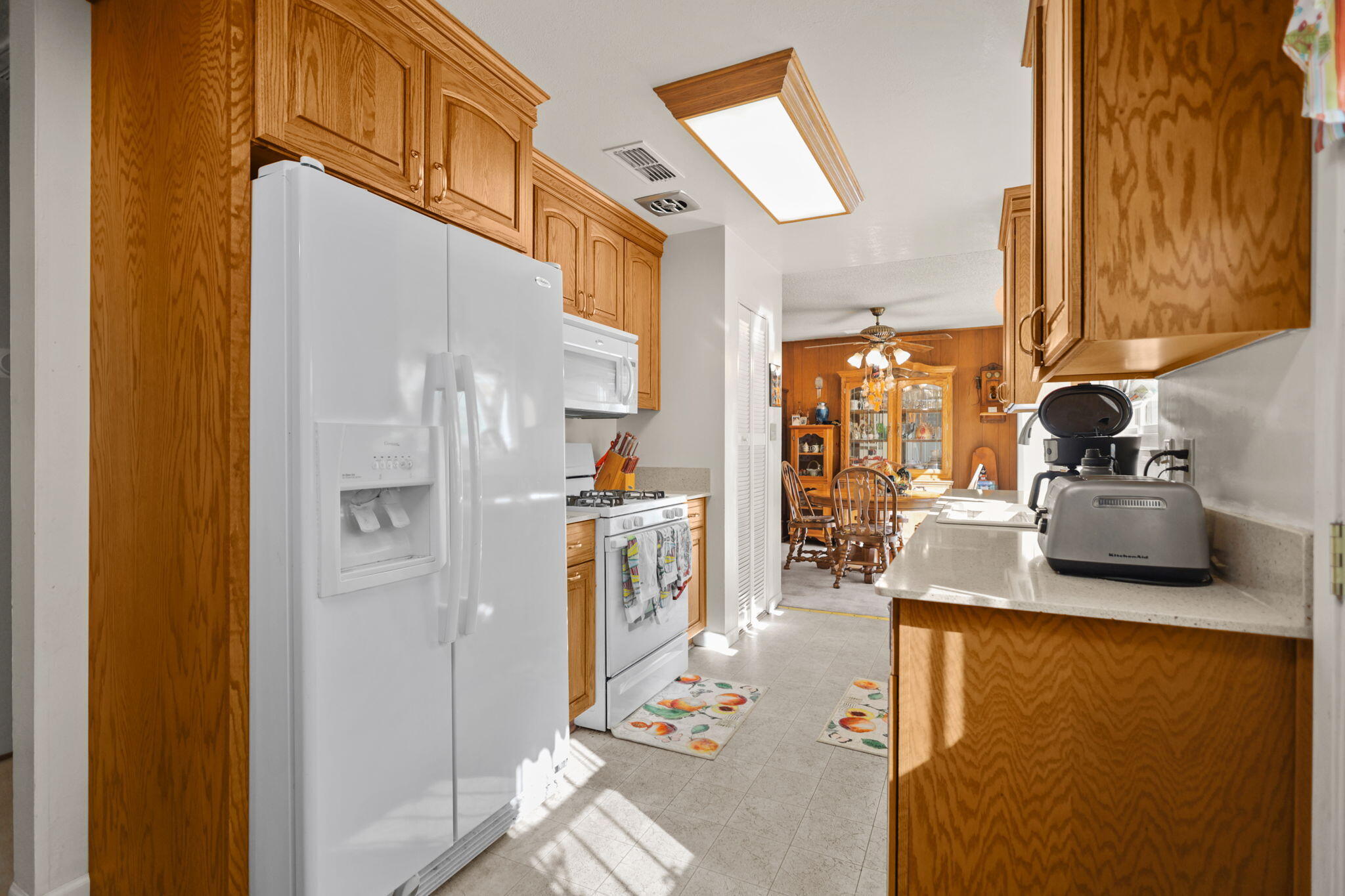2631 Alfreda Way Redding, CA 96002 - Photo 6 of 16 a kitchen with stainless steel appliances a refrigerator a sink and a cabinets