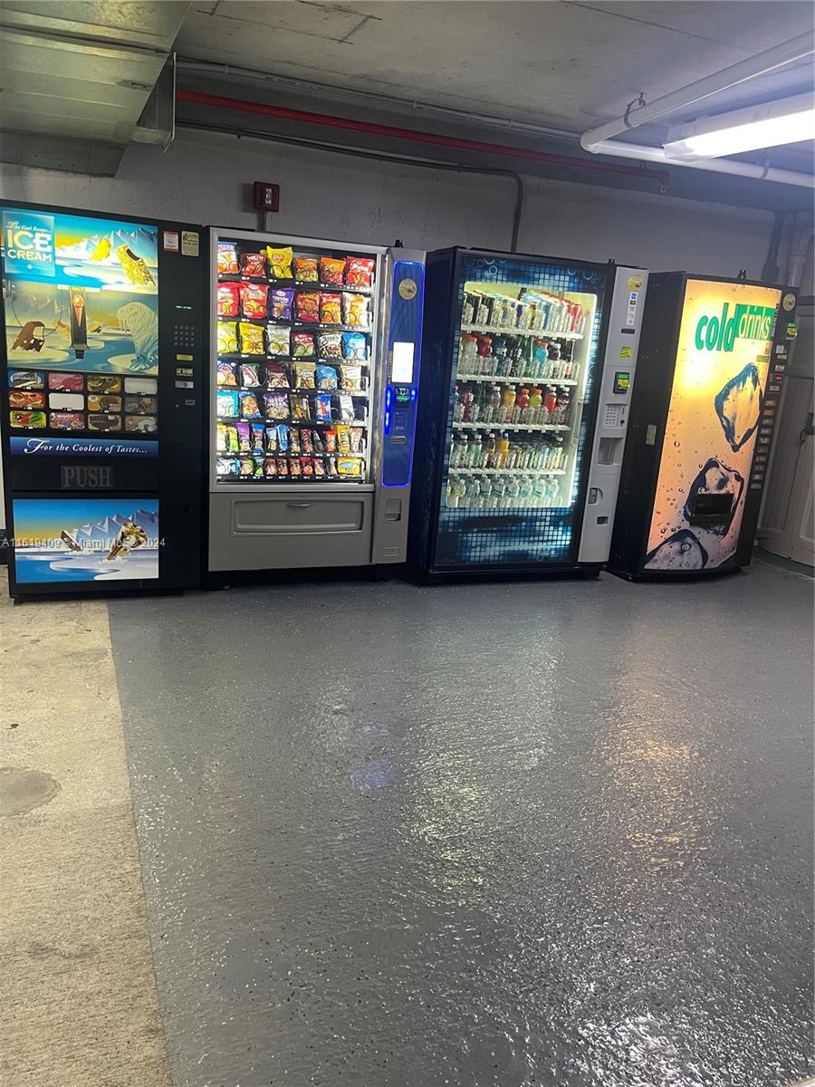 6365 Collins Avenue, Unit 2610 Miami Beach, FL 33141 - Photo 30 of 49 a view of room with window and a flat screen tv