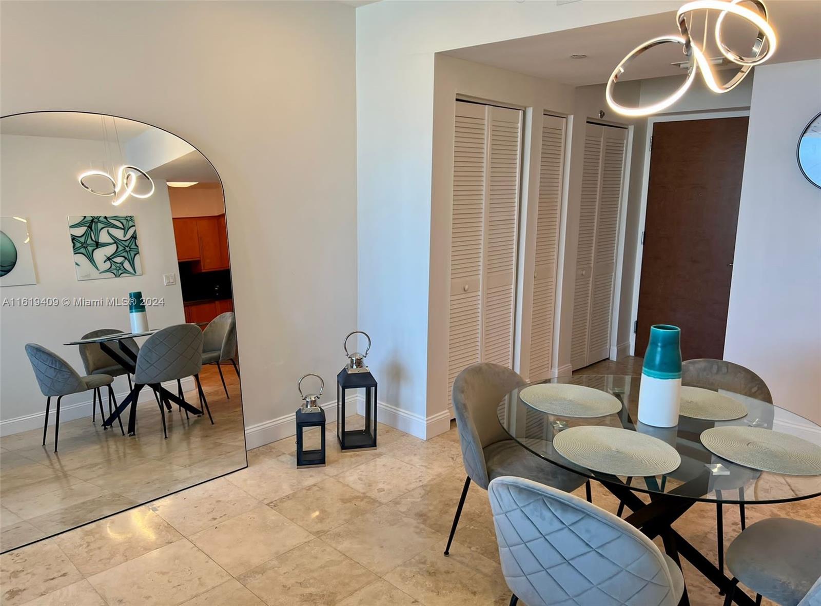 6365 Collins Avenue, Unit 2610 Miami Beach, FL 33141 - Photo 4 of 49 a view of a livingroom with furniture and a window