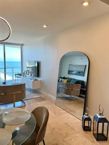 a living room with a couch and a table