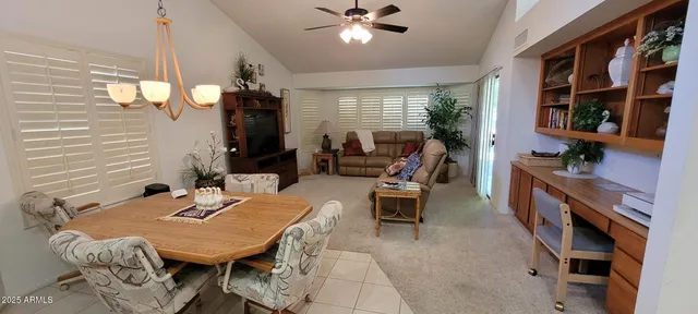 a view of a dining room with furniture