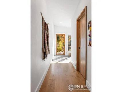 a view of a hallway with windows