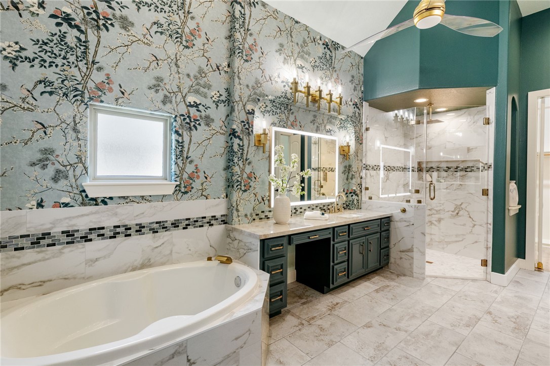 2833 Persimmon Ridge Court Bryan, TX 77807 - Photo 42 of 50 a bathroom with a bathtub and a sink