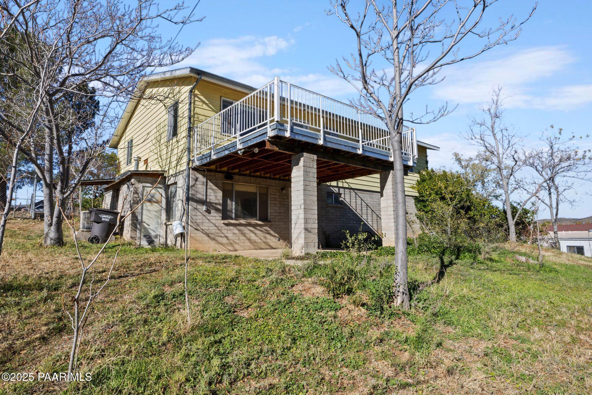 10231 Fir Street Mayer, AZ 86333 - Photo 30 of 50 a view of a house with a yard