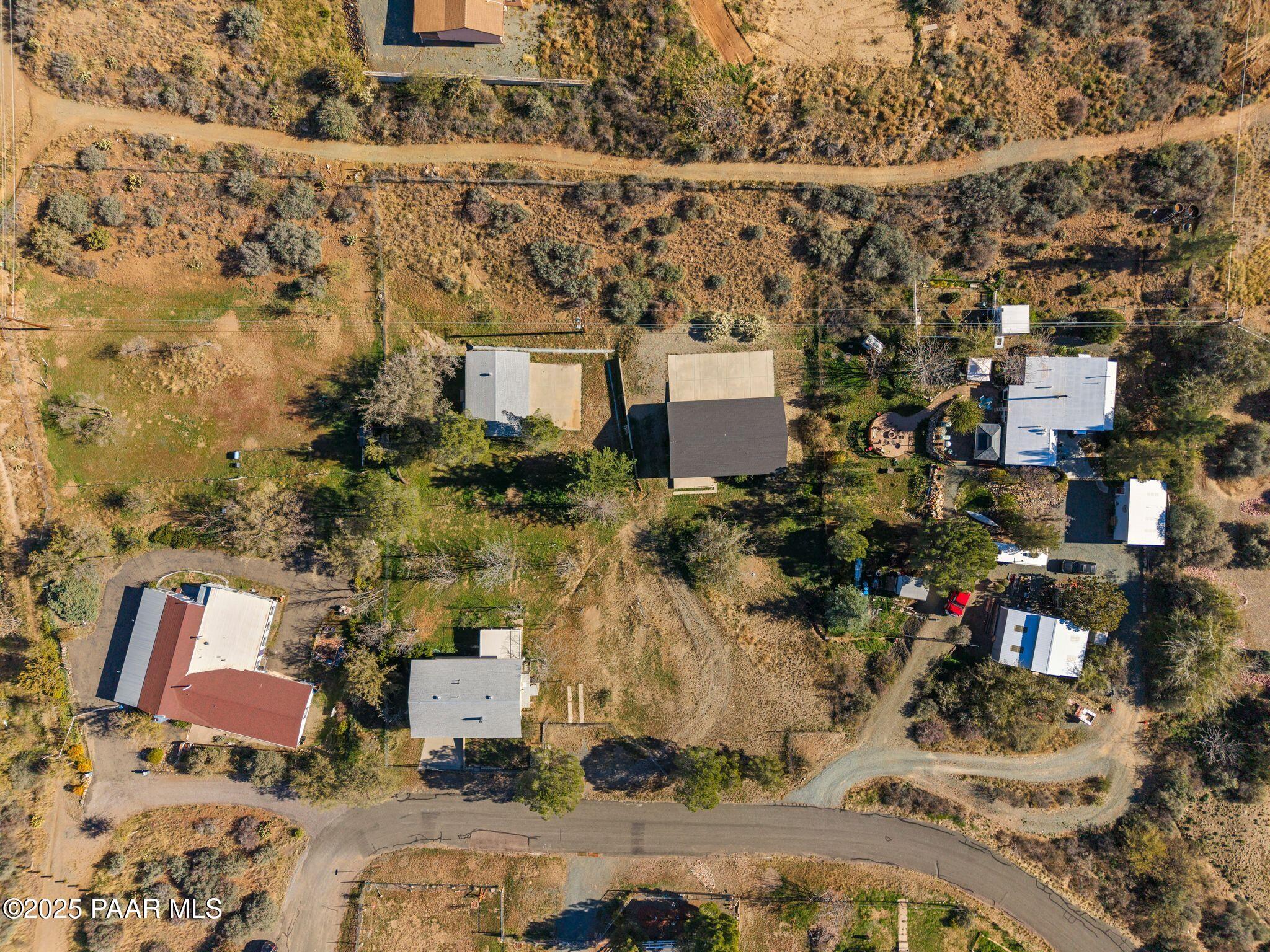 10231 Fir Street Mayer, AZ 86333 - Photo 45 of 50 an aerial view of residential houses with outdoor space