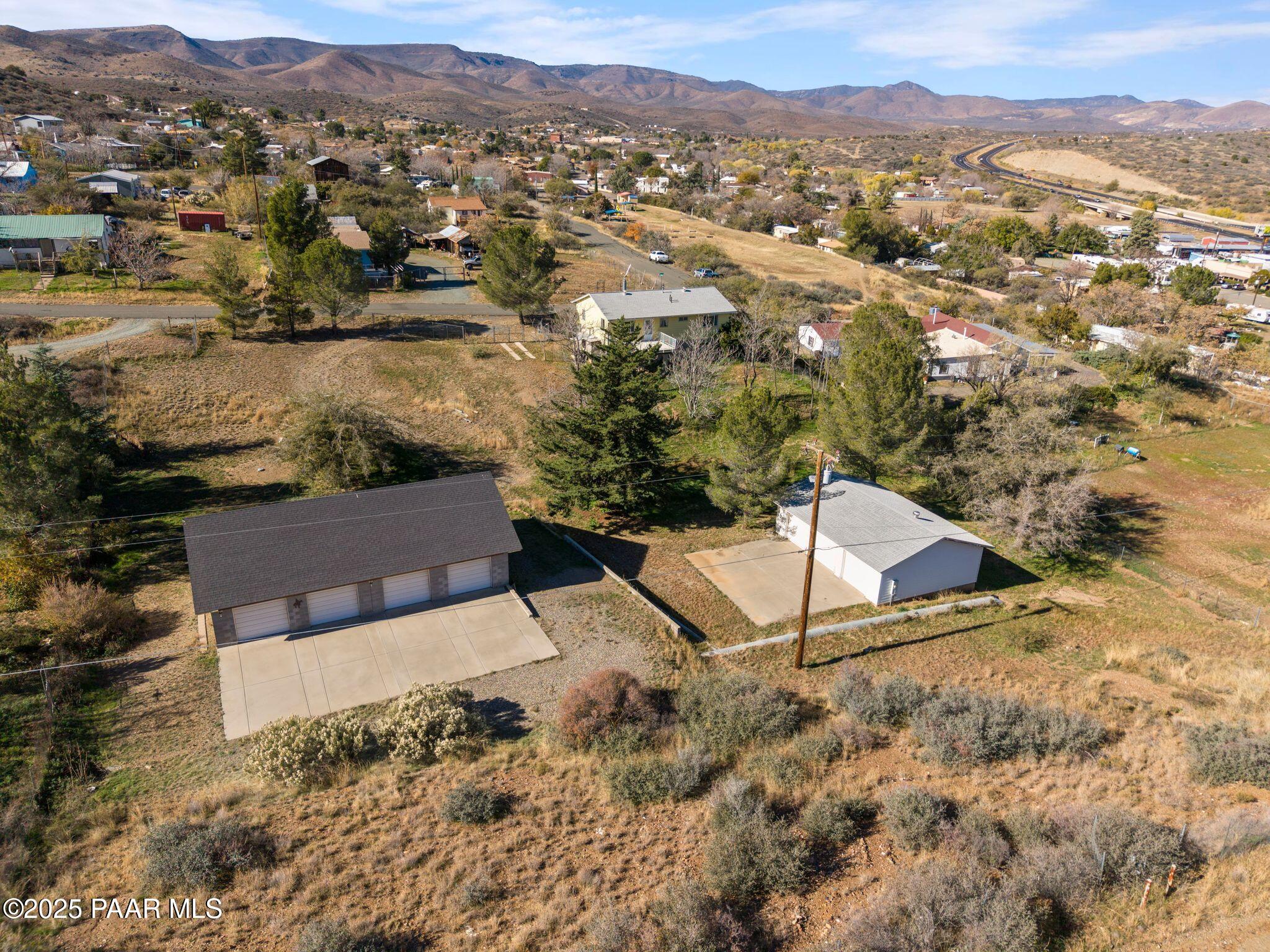 10231 Fir Street Mayer, AZ 86333 - Photo 47 of 50 a view of a house with a yard and mountain