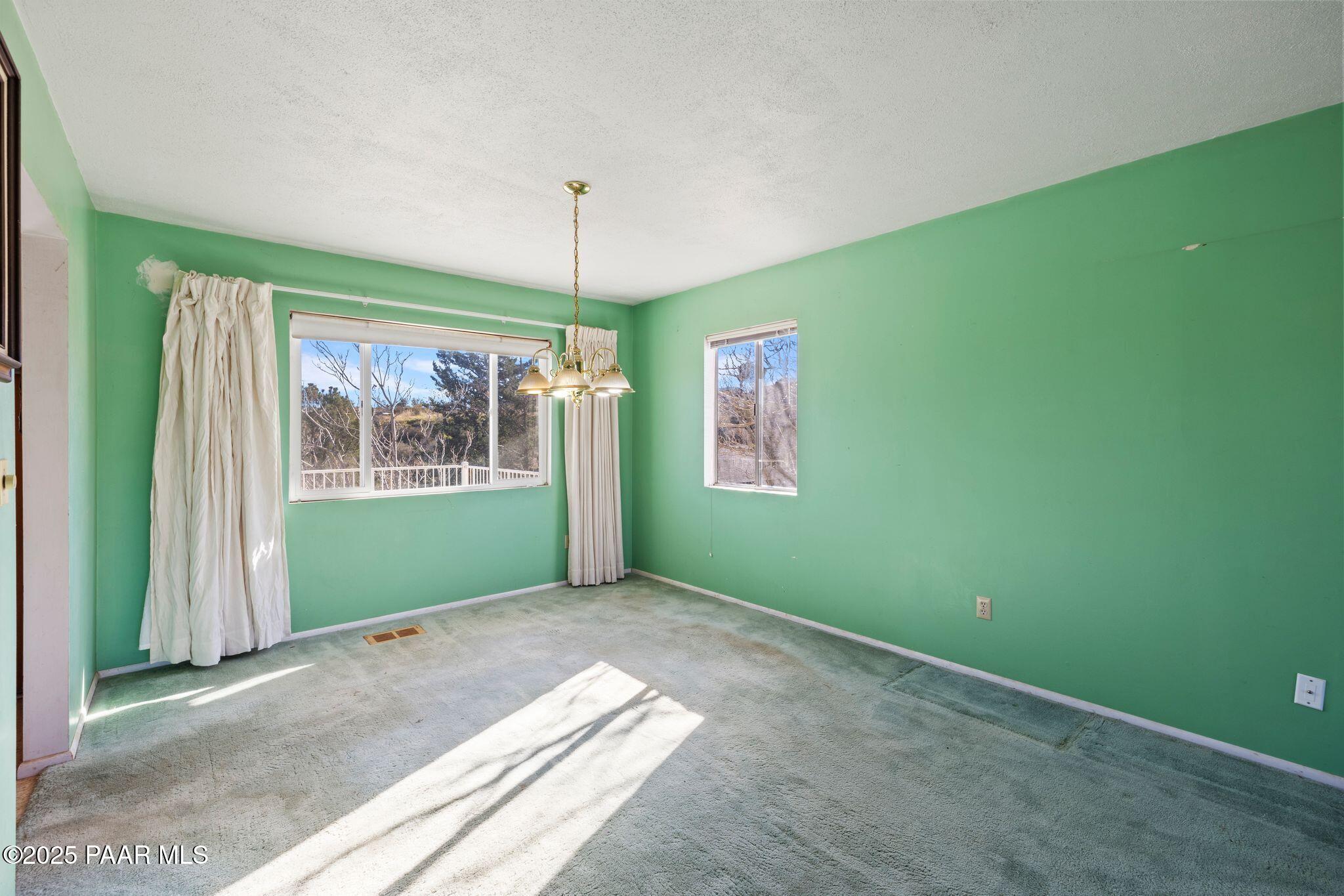 10231 Fir Street Mayer, AZ 86333 - Photo 7 of 50 a view of an empty room with window