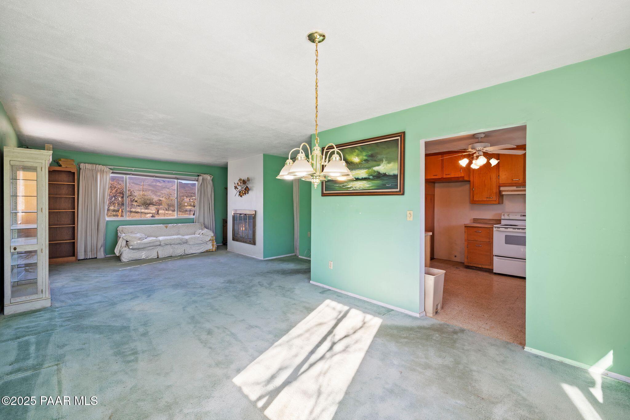 10231 Fir Street Mayer, AZ 86333 - Photo 8 of 50 a view of a livingroom with furniture and window