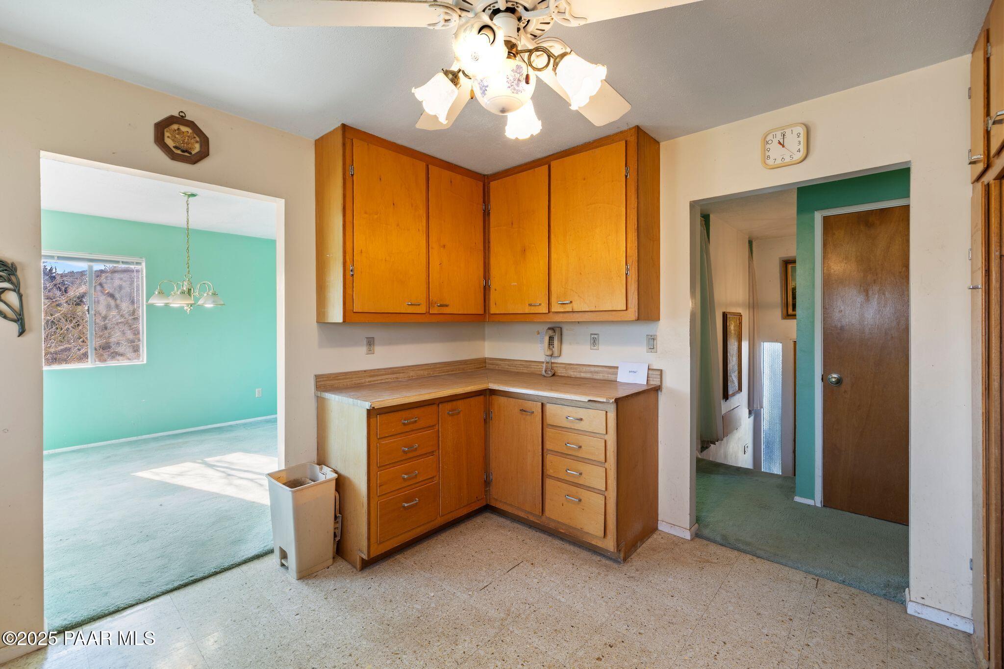 10231 Fir Street Mayer, AZ 86333 - Photo 10 of 50 a spacious bathroom with a double vanity sink and a mirror