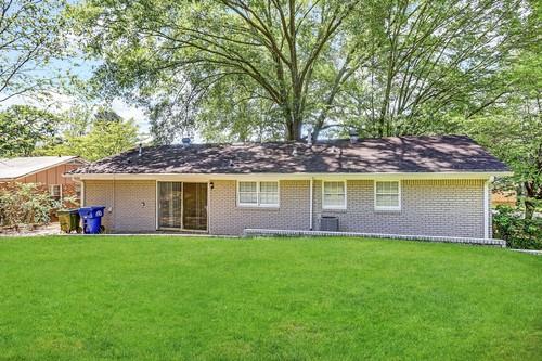 3539 Meadowridge Drive Southwest Atlanta, GA 30331 - Photo 15 of 25 front view of a house with a yard