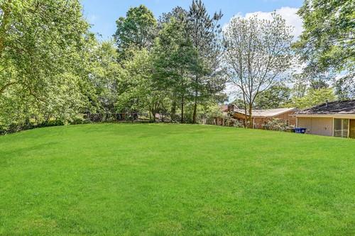 3539 Meadowridge Drive Southwest Atlanta, GA 30331 - Photo 17 of 25 a view of a field of grass and trees