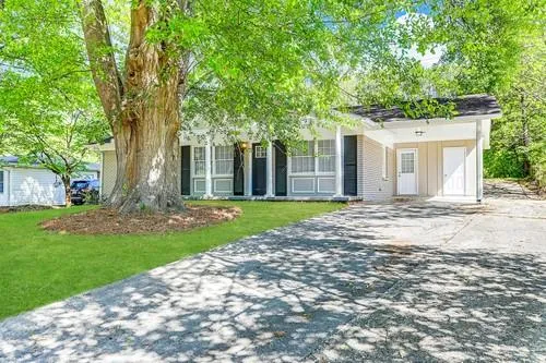 front view of a house with a yard
